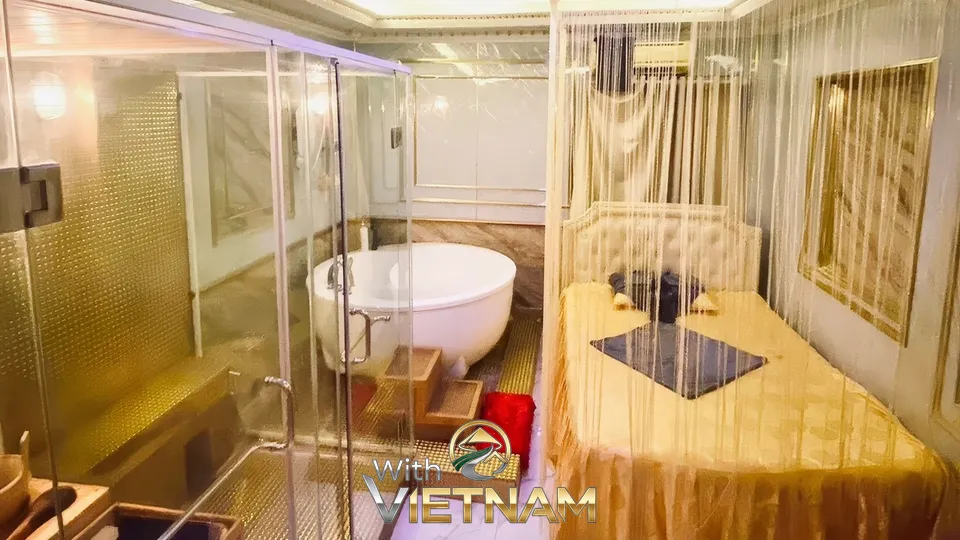 금색 커튼과 욕조가 있는 마사지 룸