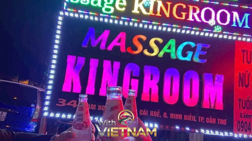 화려한 네온사인 간판과 음료수 병