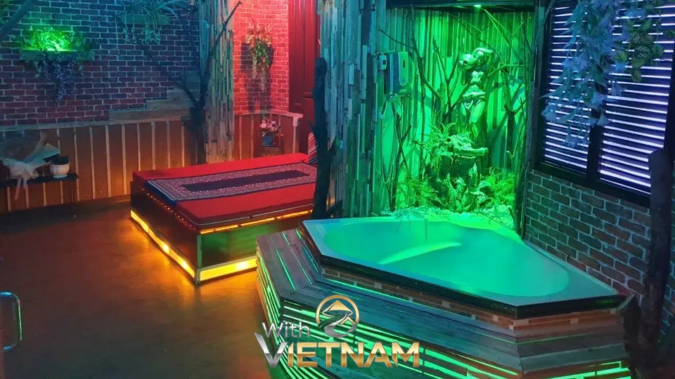 초록색 조명과 벽돌 인테리어가 돋보이는 자쿠지 객실