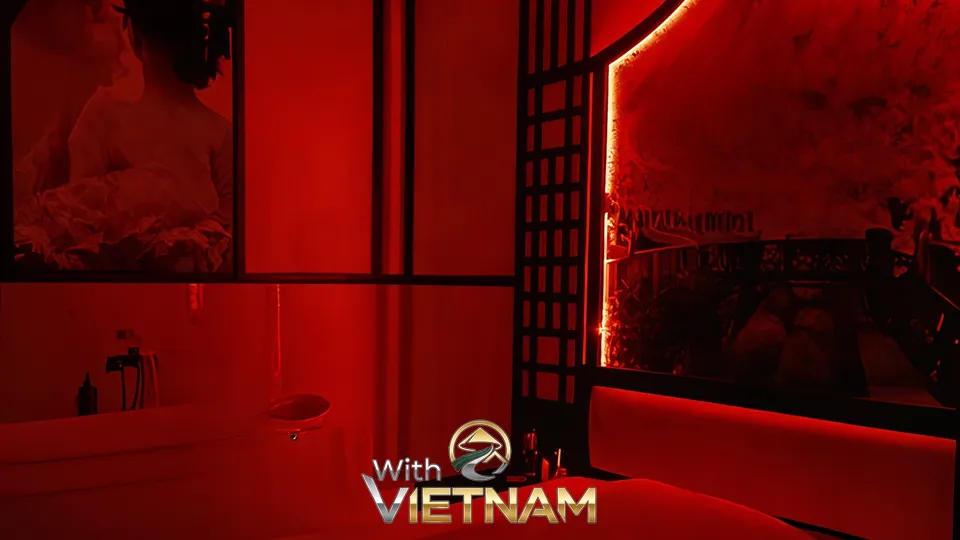 붉은 조명의 욕조가 있는 방