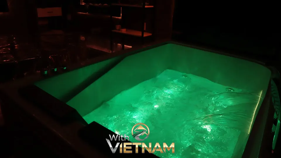 녹색 조명의 욕조