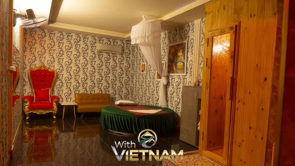 붉은 왕좌 의자와 둥근 마사지 베드