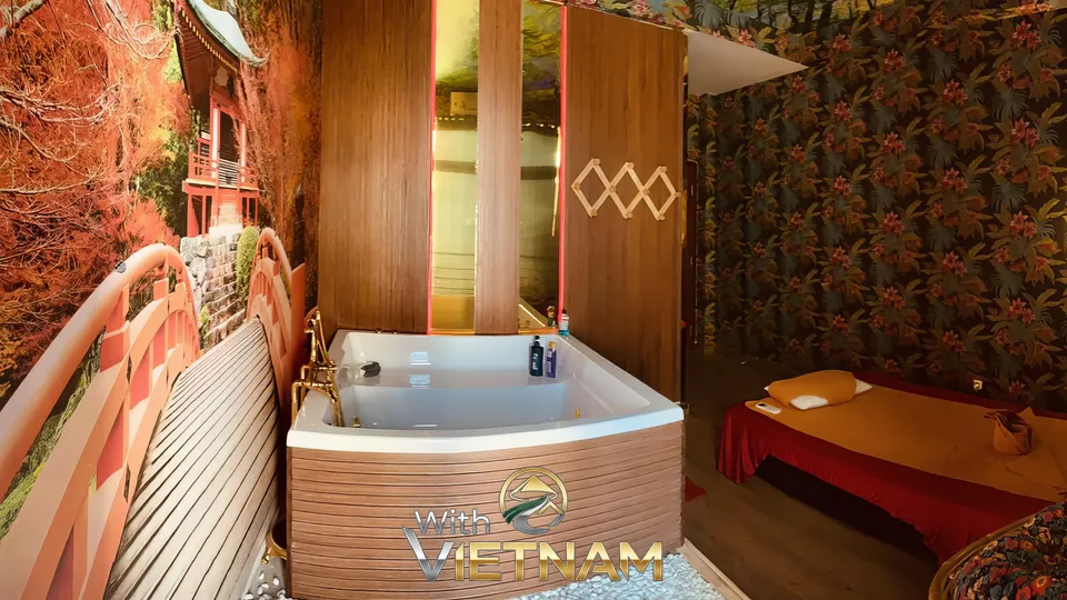 동양적인 장식의 욕조와 마사지 베드