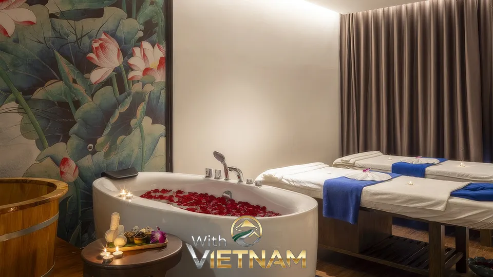 황제 스파 객실의 욕조와 마사지 베드